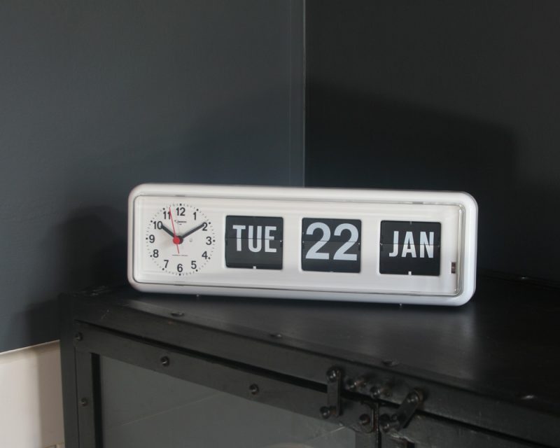 Automatic Calendar Clock on cabinet